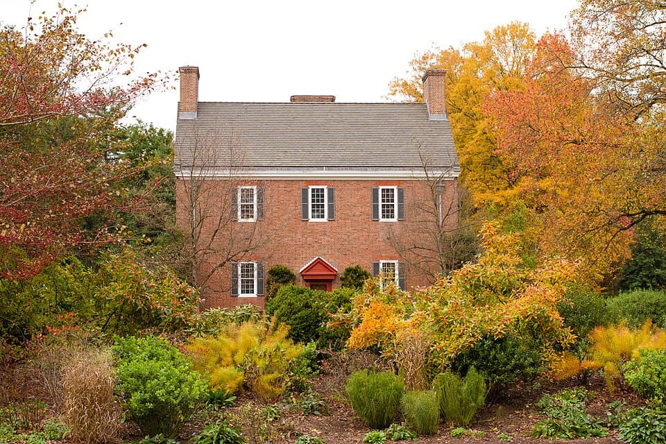 View of the Main House and South Garden of Mt. Cuba Center in the fall